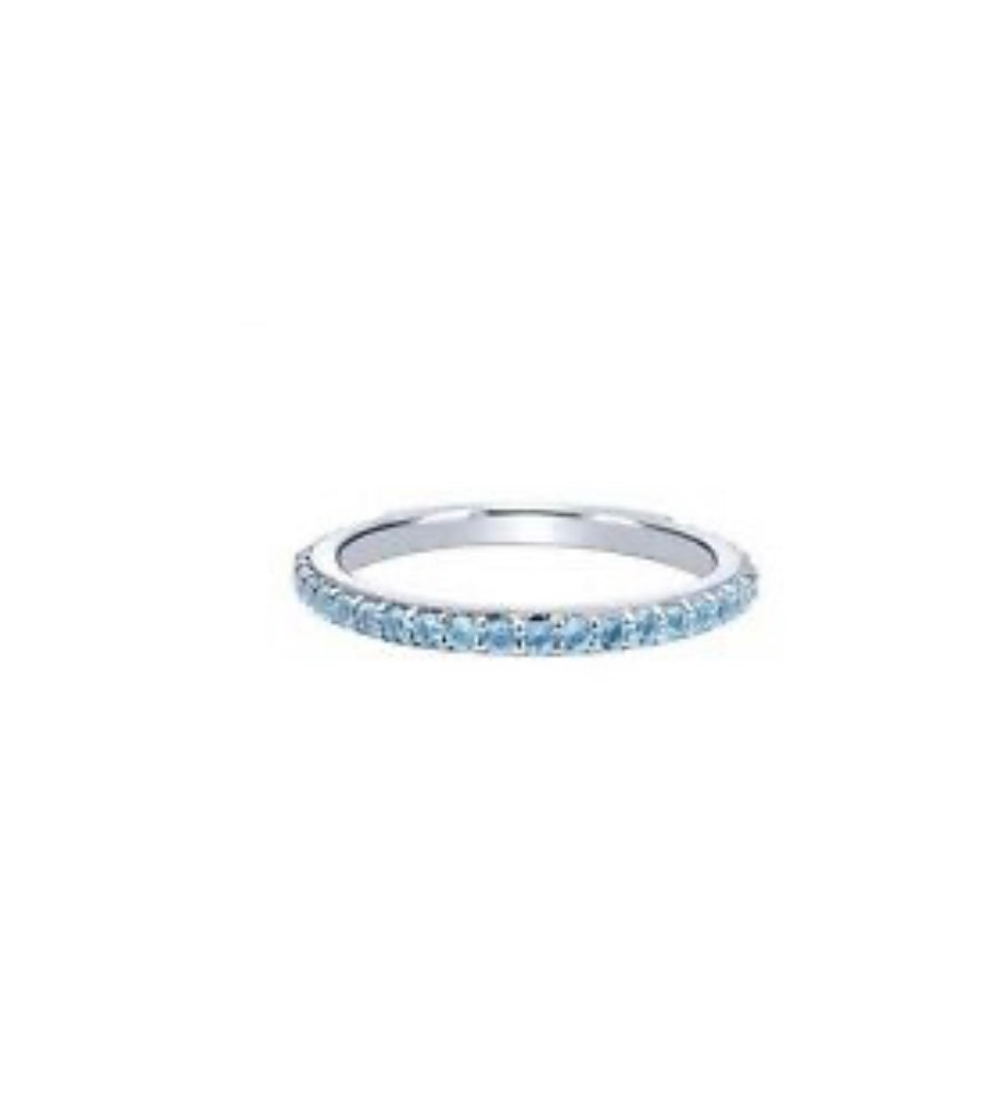 Thin blue topaz ring